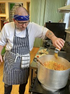 adding spices to the food